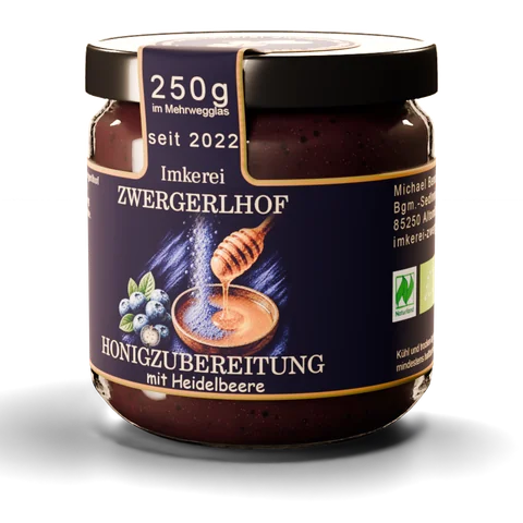 Glas Honigzubereitung mit Heidelbeere